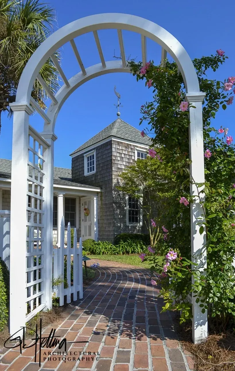 Distinctive Home #7 landscaped garden featuring rose arbor and charming outdoor architectural elements – Ponte Vedra Beach, FL