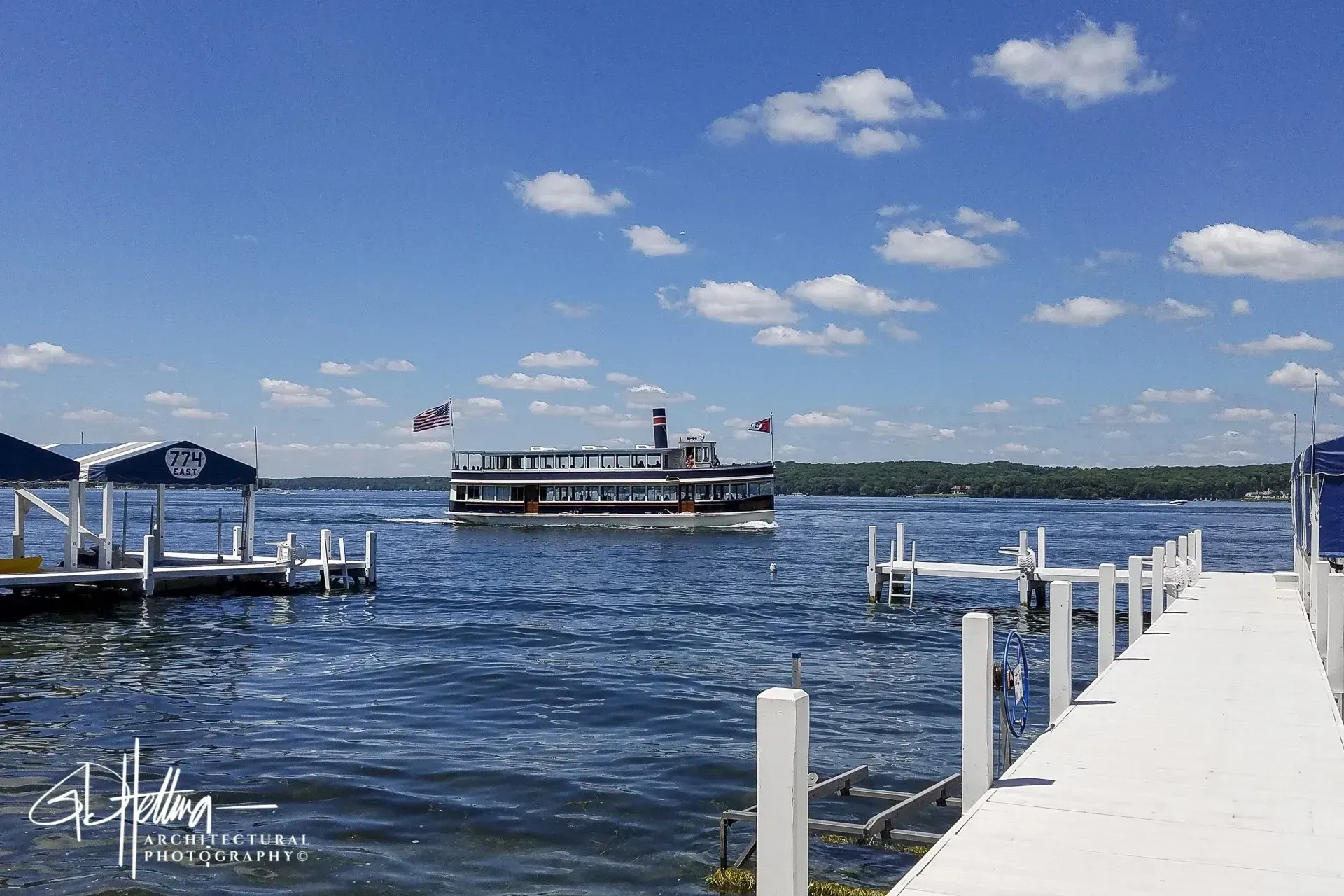 Geneva Lake mailboat featuring historic waterfront transportation and scenic lake environment – Wisconsin
