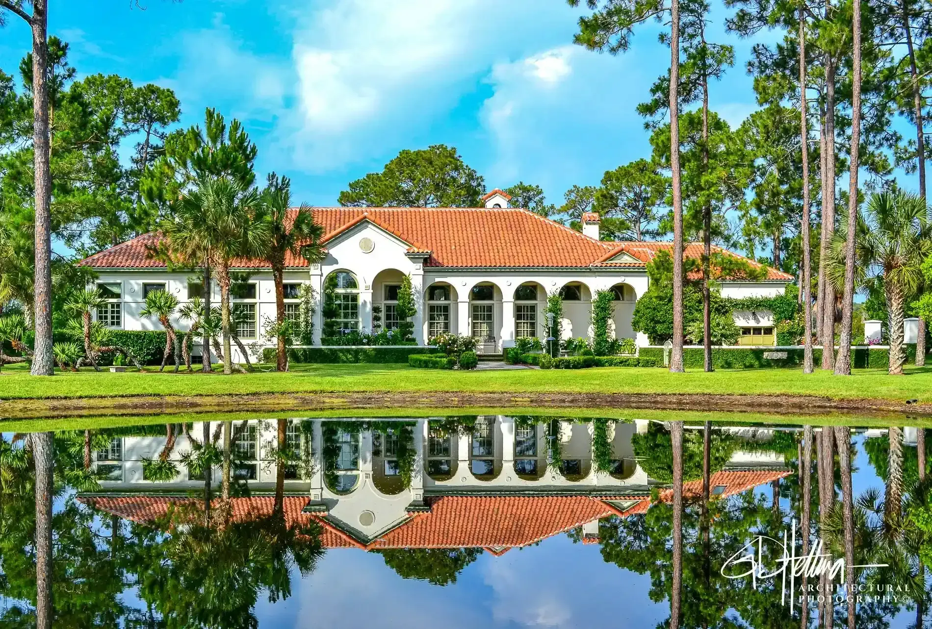 Distinctive Home #25 waterfront residence with reflective water views highlighting symmetry and coastal architecture – Ponte Vedra Beach, FL