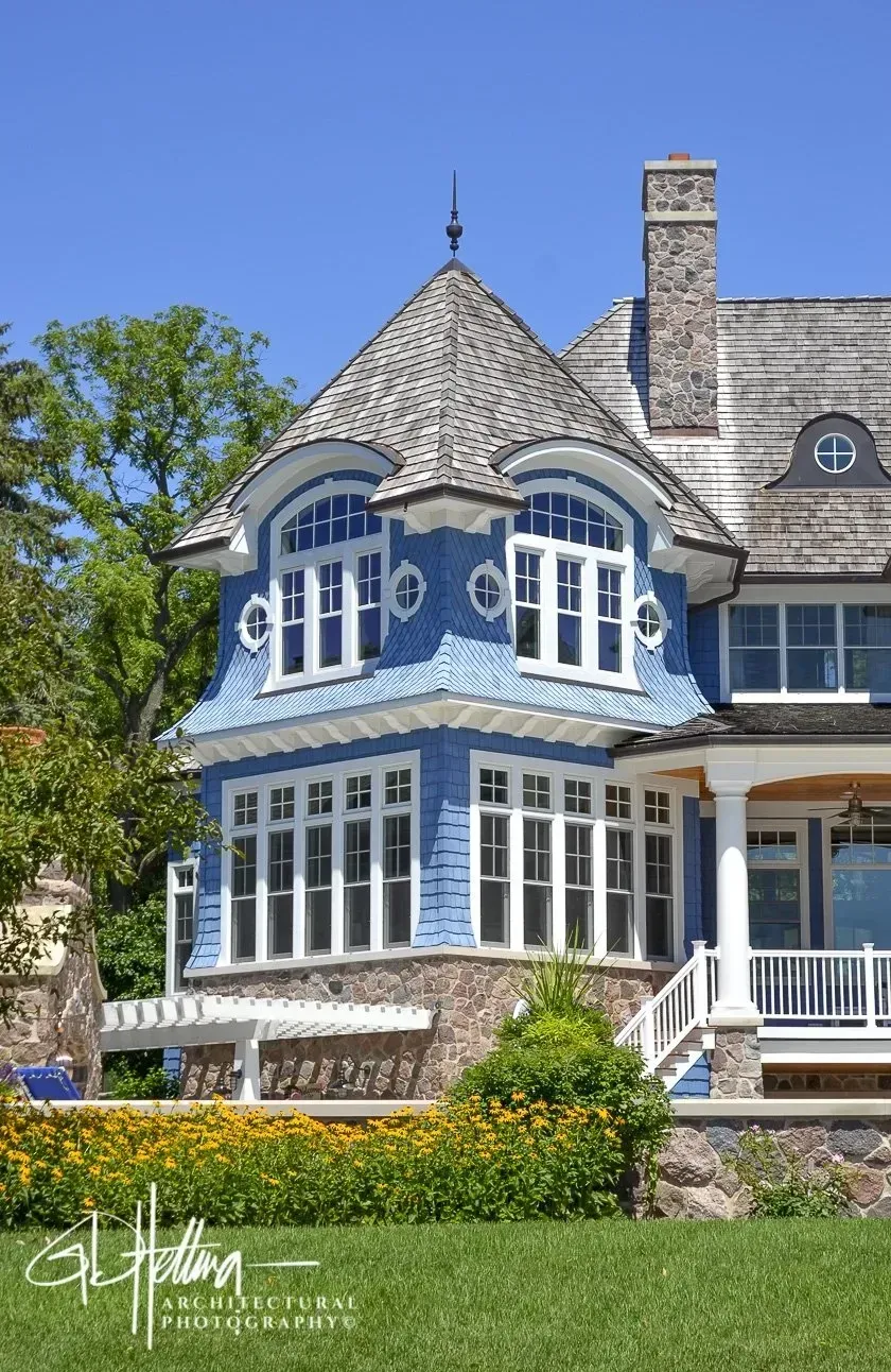 Distinctive home exterior featuring modern architectural design and vertical tower structure – Pier-101