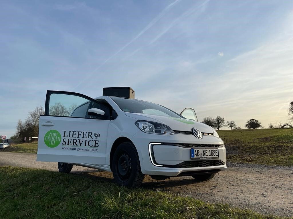 Lieferauto VW mit Beschriftung