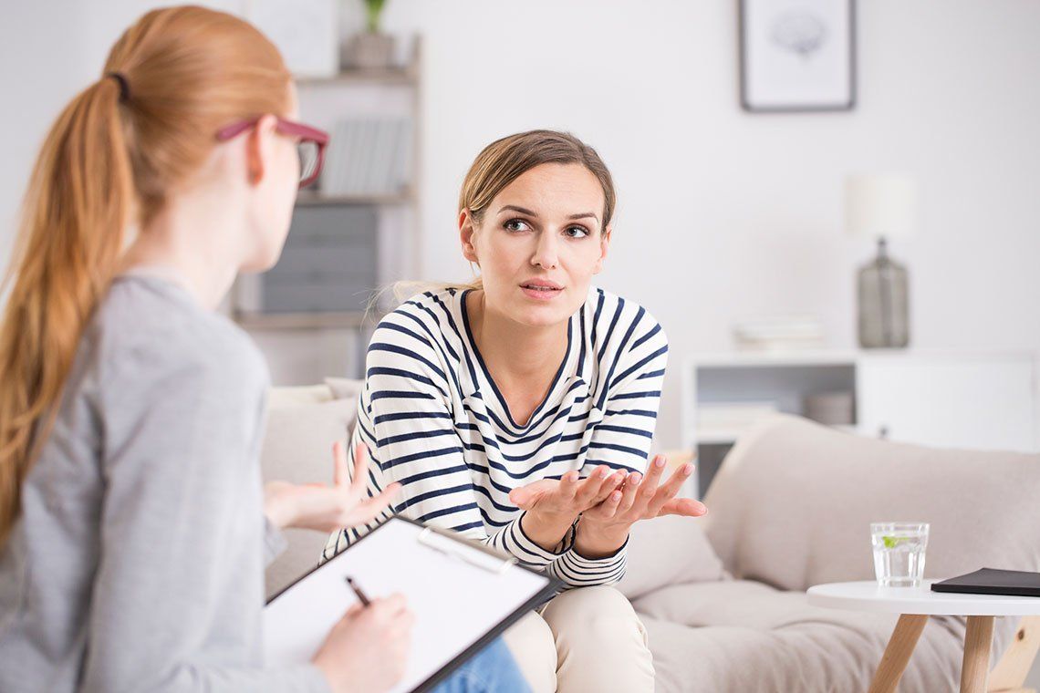Therapist Listening to a Woman — Media, PA — Serenity Wellness Center