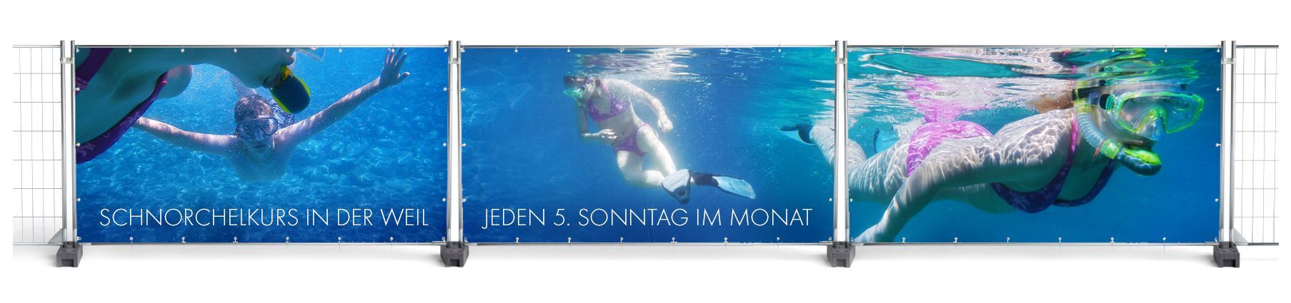 Bauzaun-Planen mit einem durchgängigen Motiv zeigt eine Unterwasseraufnahme von schnorchelden Jugendlichen