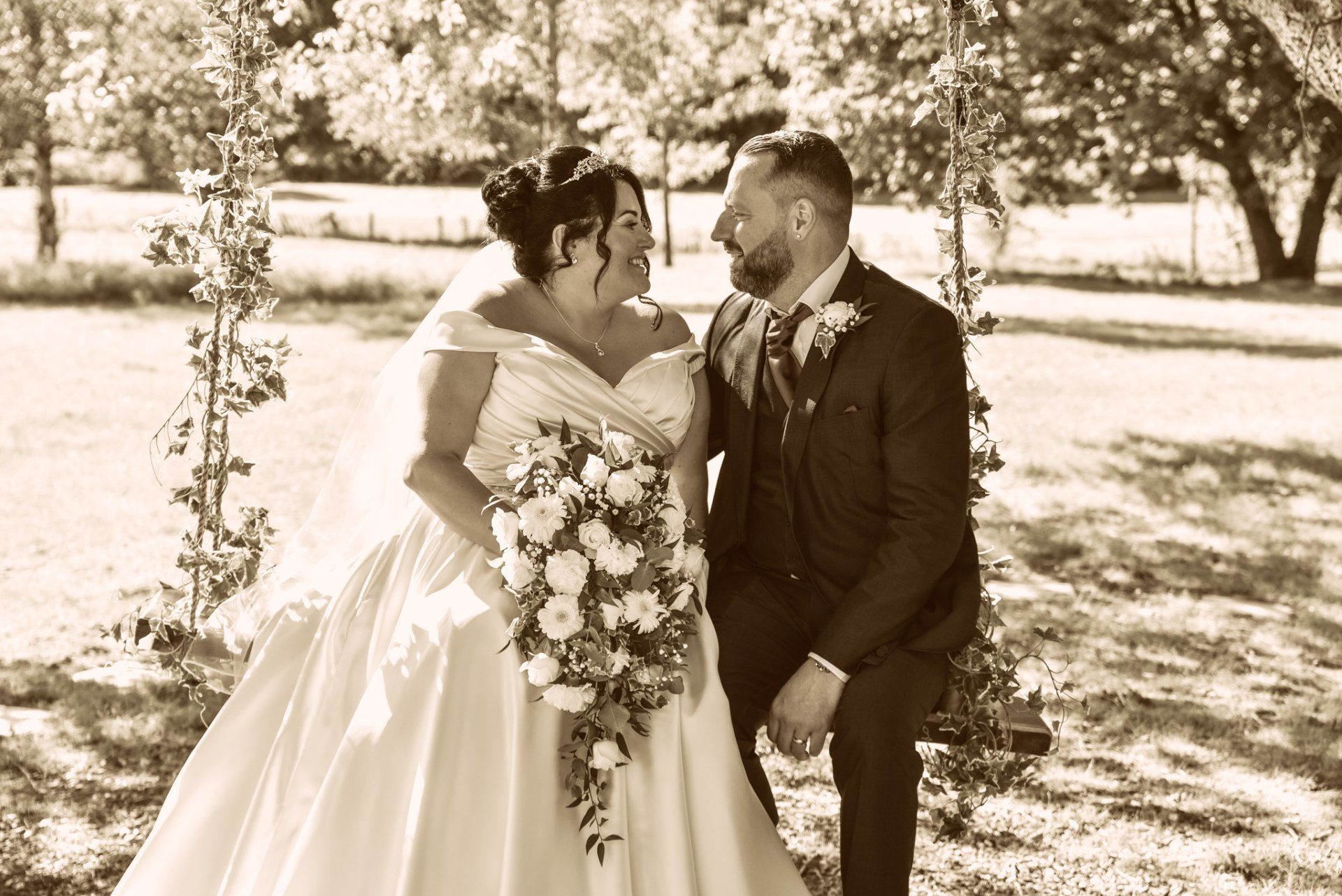Bride & Groom on a swing