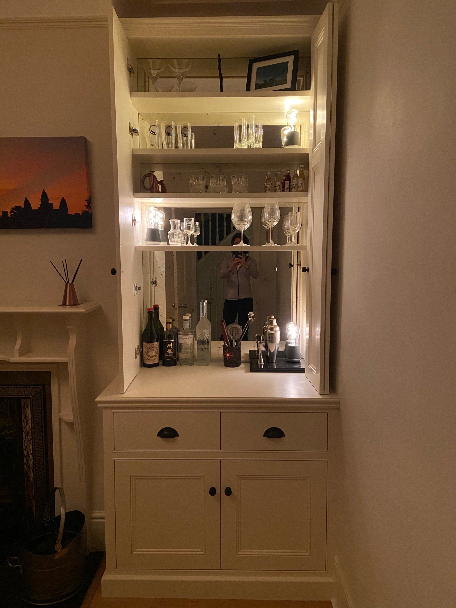 Bespoke alcove bar unit with drawers cupboards and mirrored backing in Sheen, Richmond