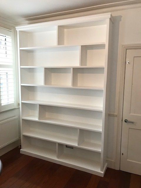 Bespoke library bookcase with custom bookshelf and shelving sections in Kew