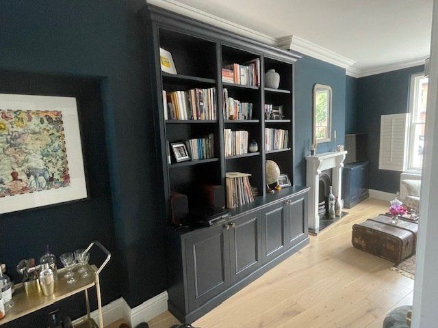 built in bookcase and media unit with shelving and cupboards, custom fitted living room furniture Kew