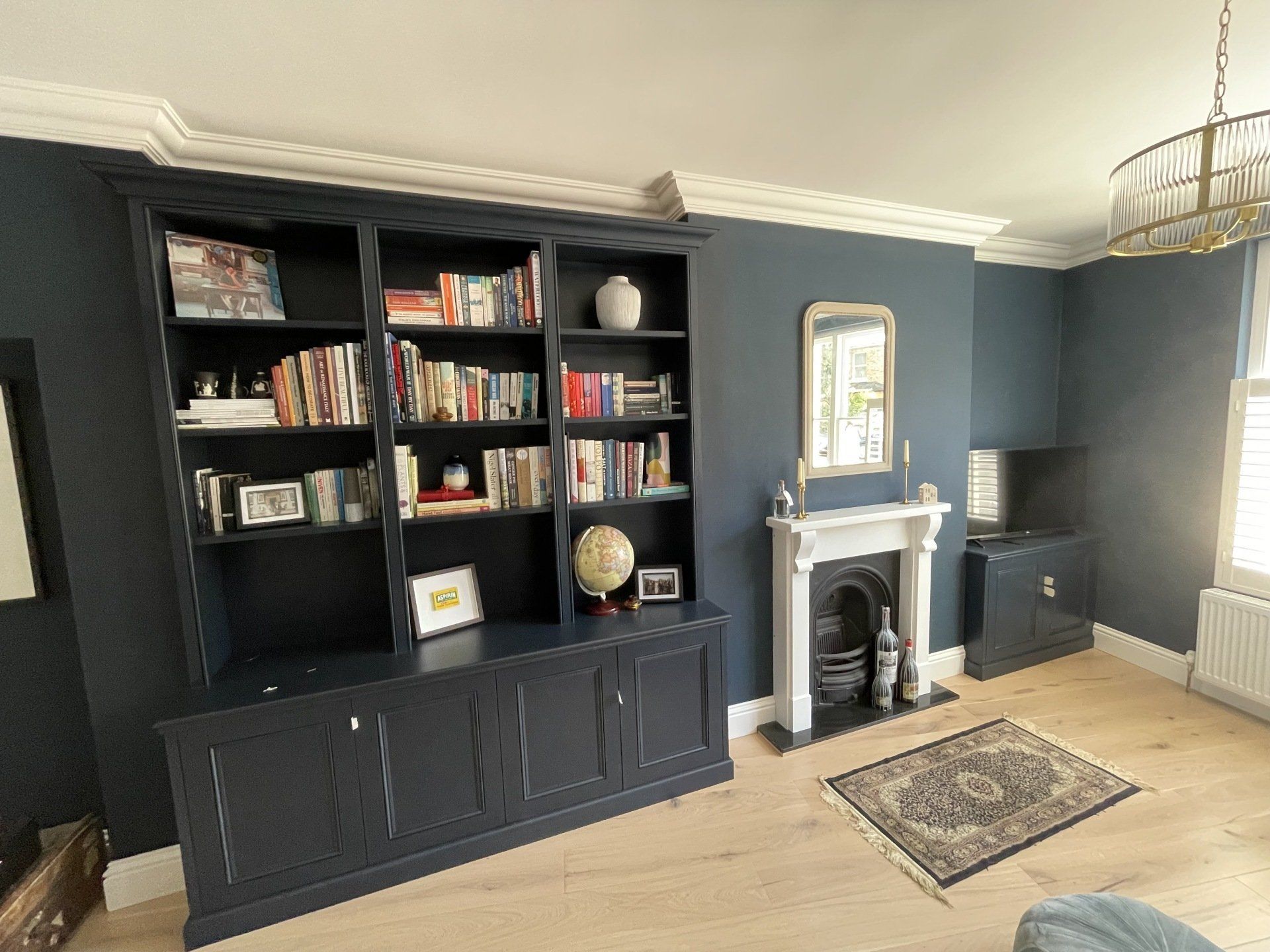 Bespoke built-in alcove cupboards and shelving, custom-made to size by a joiner in Richmond and Twickenham.