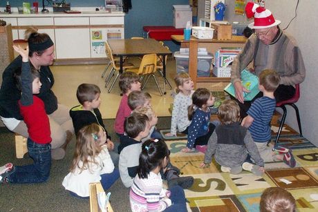 Reading to children on Dr. Seuss day.