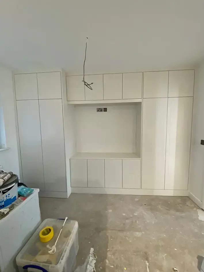 Media cupboards sprayed white