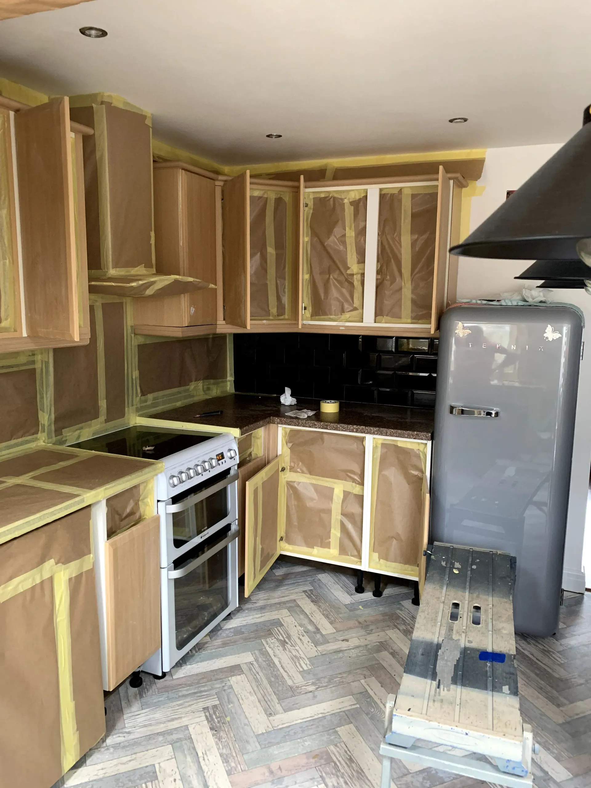 Sprayed Tech Solutions' Pricing Guide: Spray Paint Kitchen Cabinets in the UK
