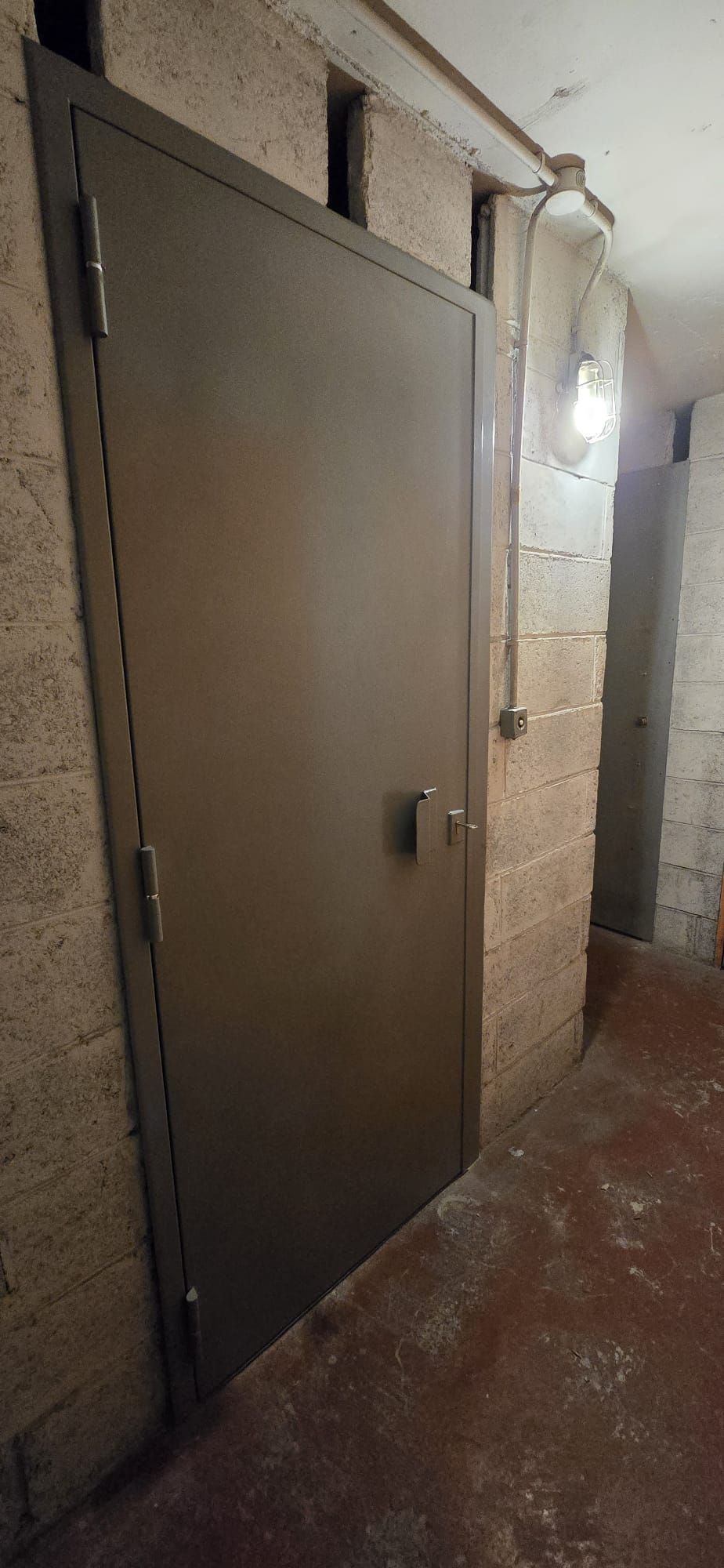 Porte de cave blindée après travaux