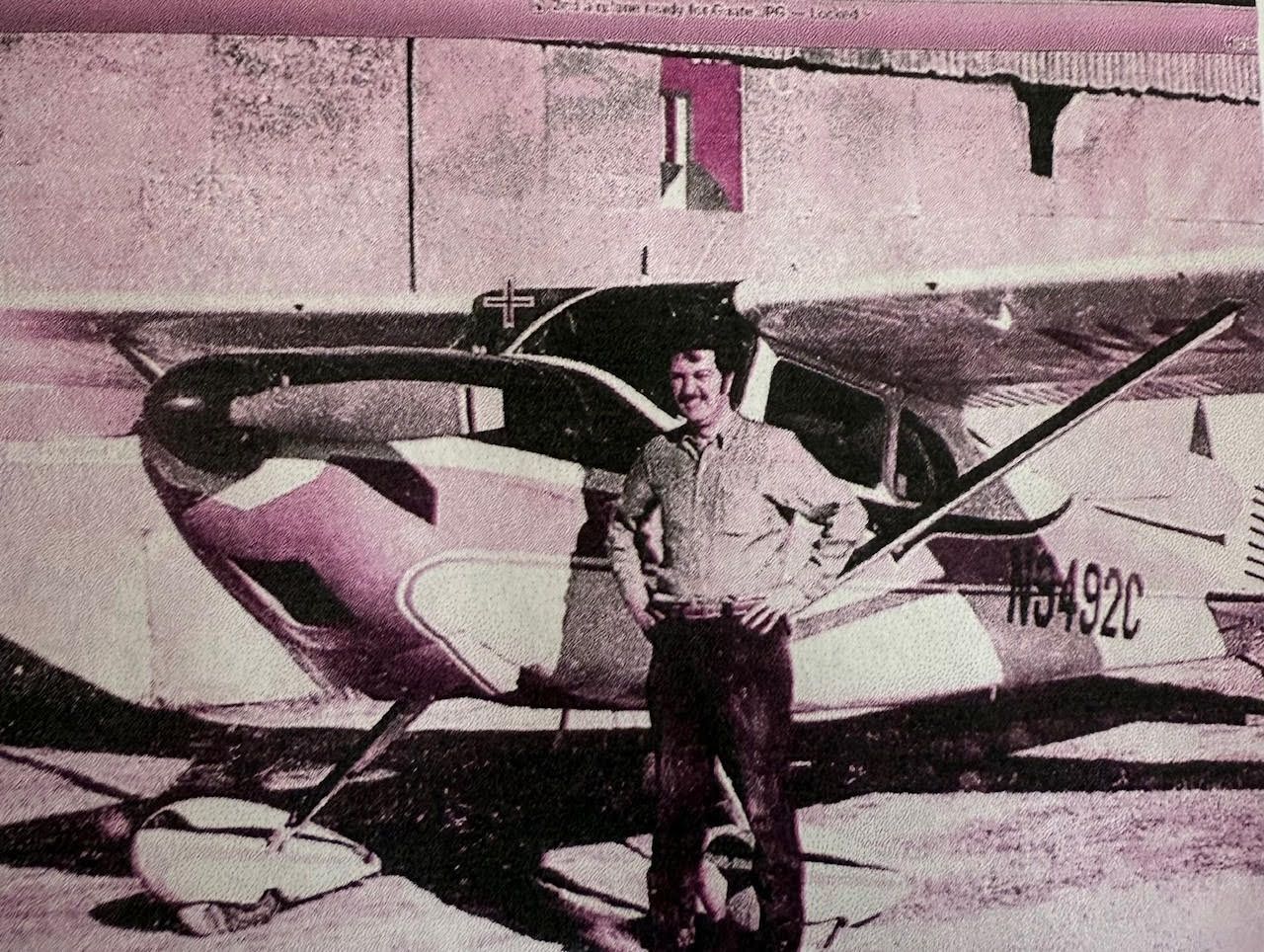 Don Donaldson, from Agape Ministries in front of his airplane.