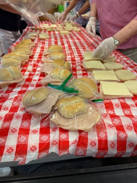 Son Light Bible Church. Feed the hungry food prep. Bagged lunches