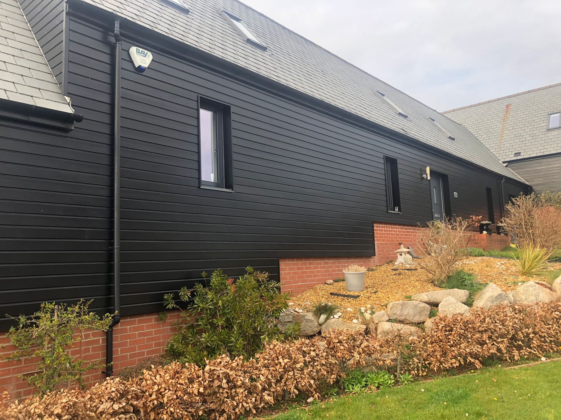 Local Totnes painter and decorator painting living room