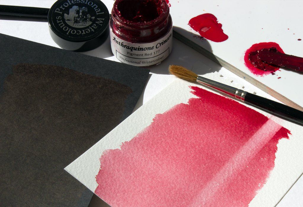 Graduated washes of Anthraquione Crimson on black and white watercolour paper Graduated wash of A J Ludlow Colour's Anthraquinone Crimson watercolour