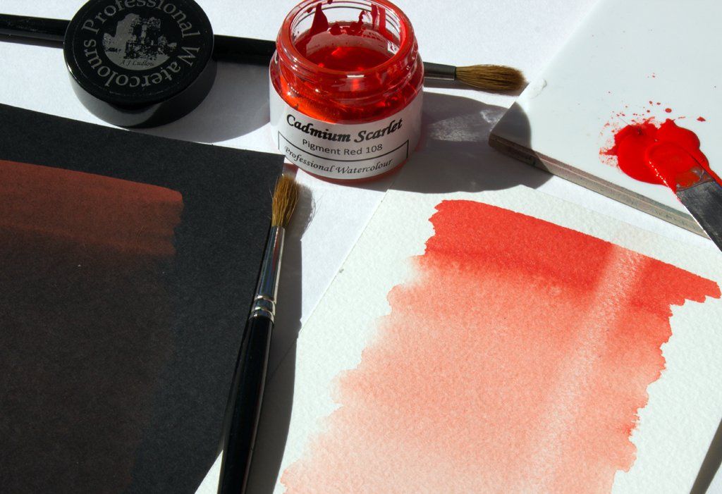 Graduated washes of Cadmium Scarlet on black and white watercolour paper Graduated wash of A J Ludlow Colour's Cadmium Scarlet