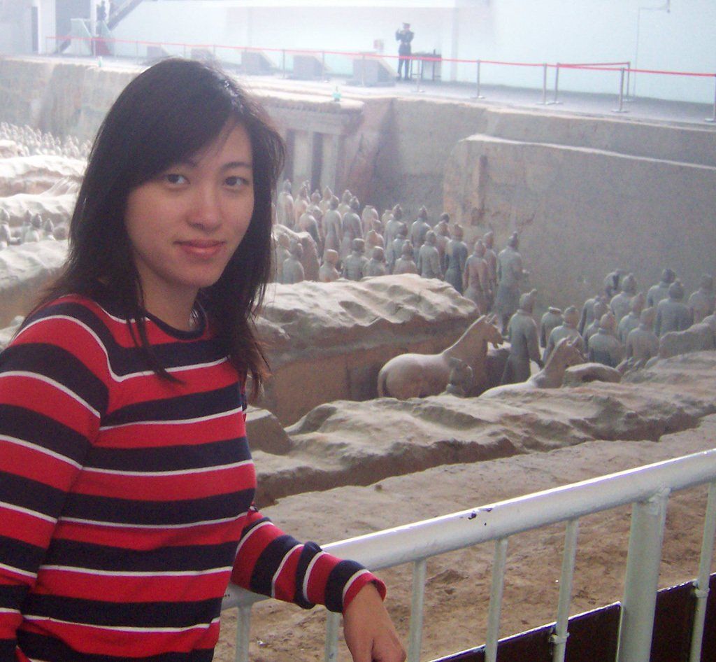 The next leg of our 2007 Chinese adventure, Meiru stands in front of the 6,000 terracotta warriors in Pit 1, Xian. Terracotta Army at Xian in October 2007.