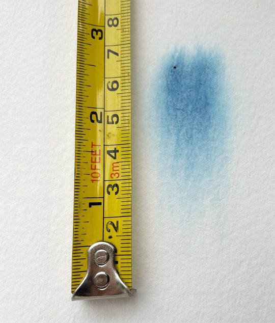 Measuring the wet-in-wet flow of a watercolour using a tape measure. Measuring the wet-in-wet flow of a watercolour using a tape measure