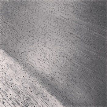 Finition bois brûlé (technique Shou-sugi-ban) pour meuble d'intérieur design