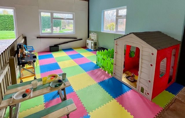 Large games room, with under 5's area. Play house, toy kitchen, black board, table tennis, air hockey, pool, table football