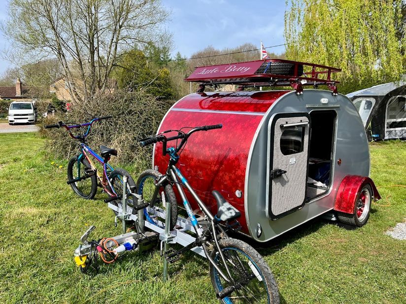 Mini caravan, pod set up of one of our guests. Disco ball and seating inside.