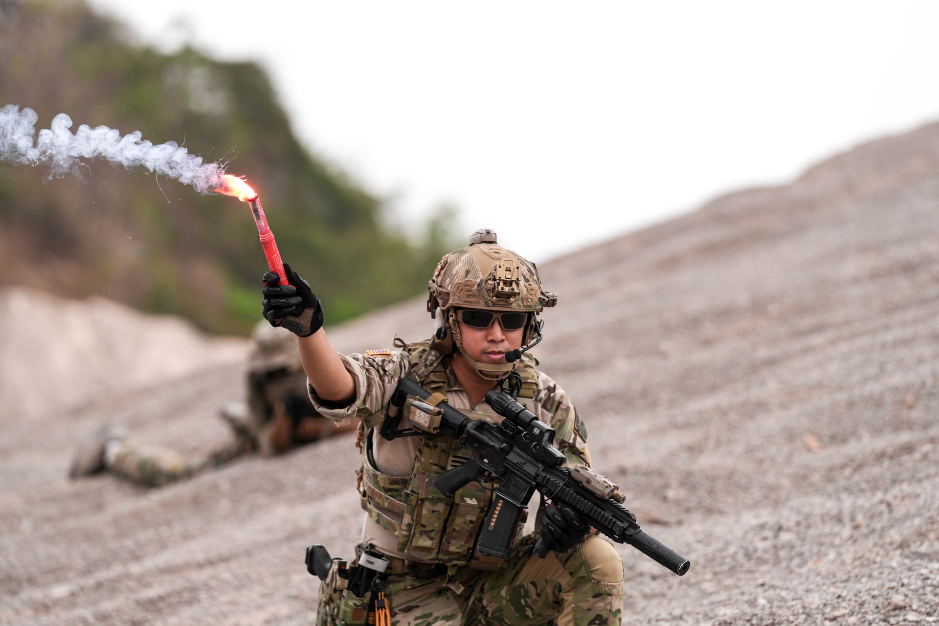 Hand held signals used by the military use pyrotechnic igniters
