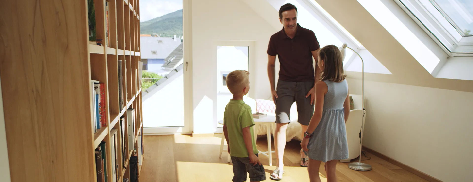 Bright living space with roof windows and integrated insect screens – fresh air without insects