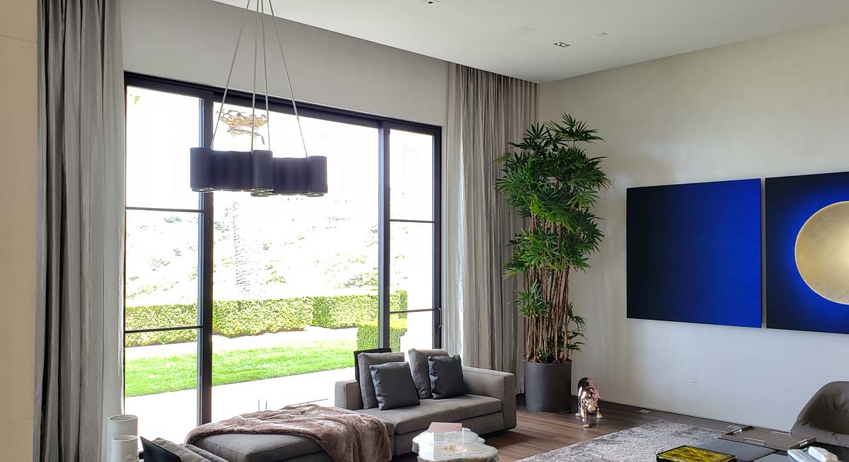 Motorized Drapery Curtain panels under suffit in modern living room Irvine