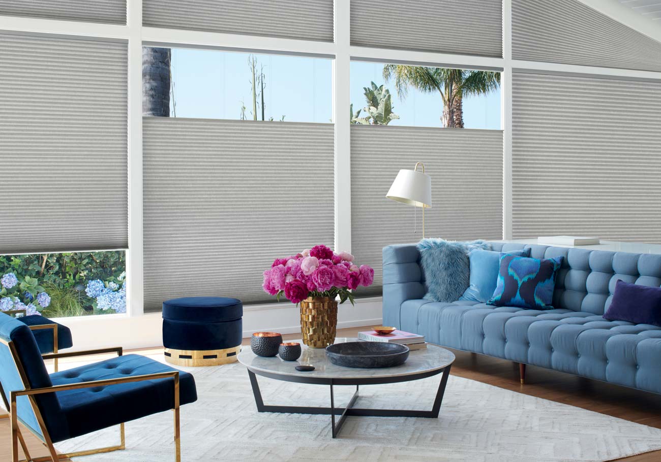 Motorized Hunter Douglas Duette honeycomb cellular shades in modern contemporary blue pink gray living room Irvine