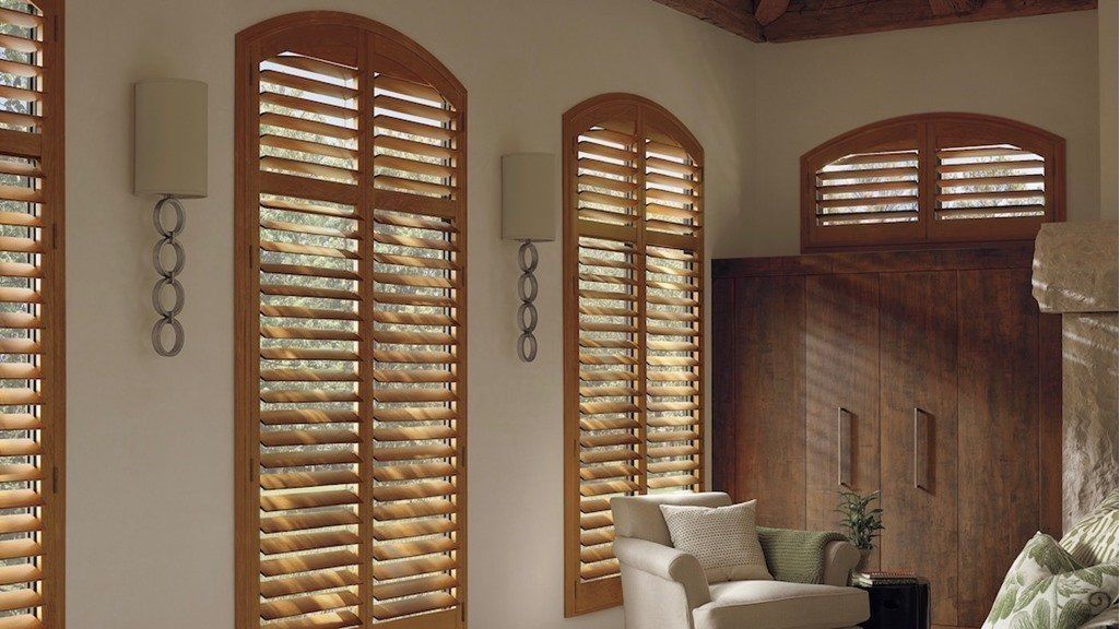 Heritance® Hardwood Shutters - Arched Windows - Living Room - Rustic Cabin - Hunter Douglas