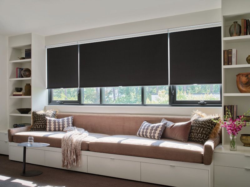 blackout roller shade in sitting area bedroom