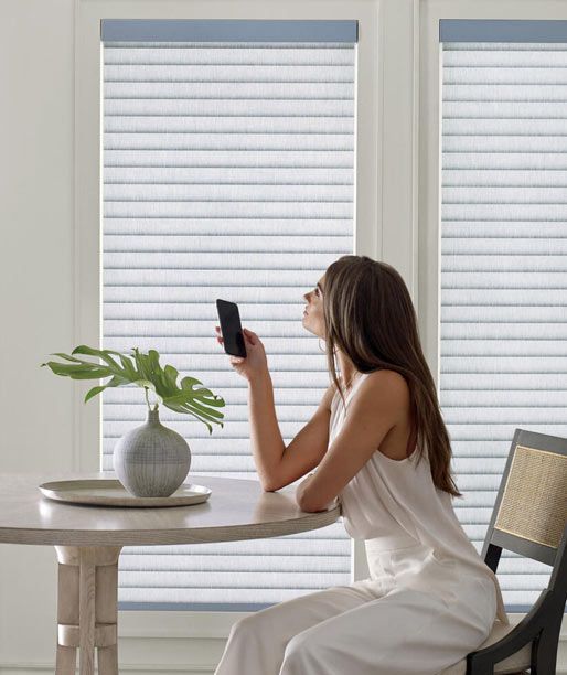 Motorized shades in dining room