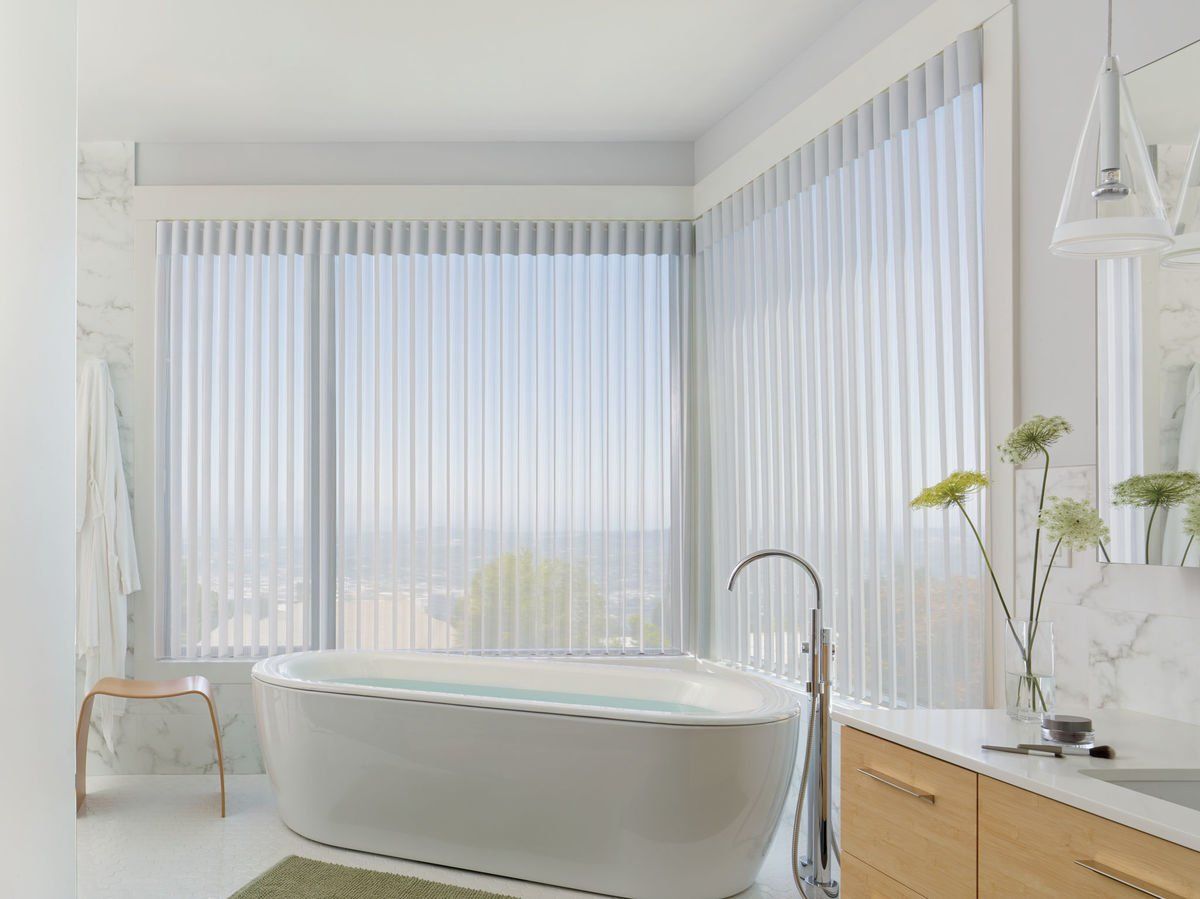 Motorized Hunter Douglas Luminette privacy sheer shades in modern white bathroom Irvine