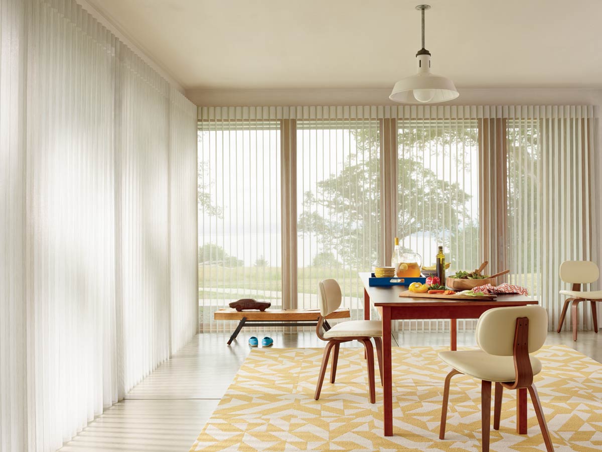 Motorized Hunter Douglas Luminette privacy sheer shades in mid century modern dining room large sliding door Irvine