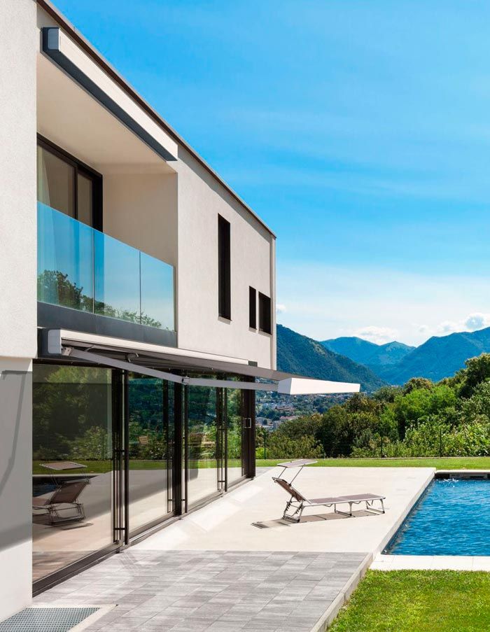 Custom Durasol awning modern poolside home Somfy Belmont shore-Naples