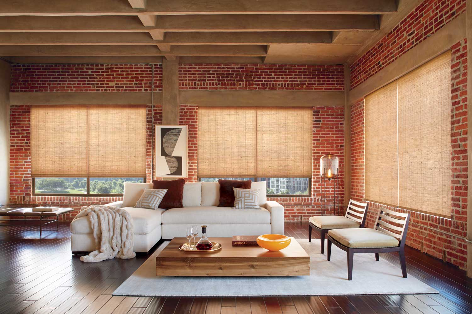 Motorized Hunter Douglas Provenance woven wood shades in industrial rustic loft living room Irvine