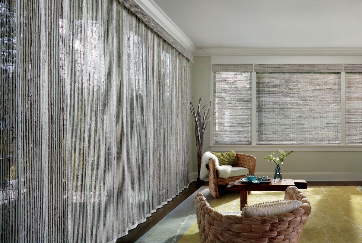 Motorized Hunter Douglas Provenance woven wood shades in modern living room sliding door Irvine