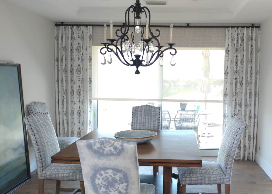 Motorized Hunter Douglas Provenance woven wood shades and custom drapery in transitional dining room Irvine