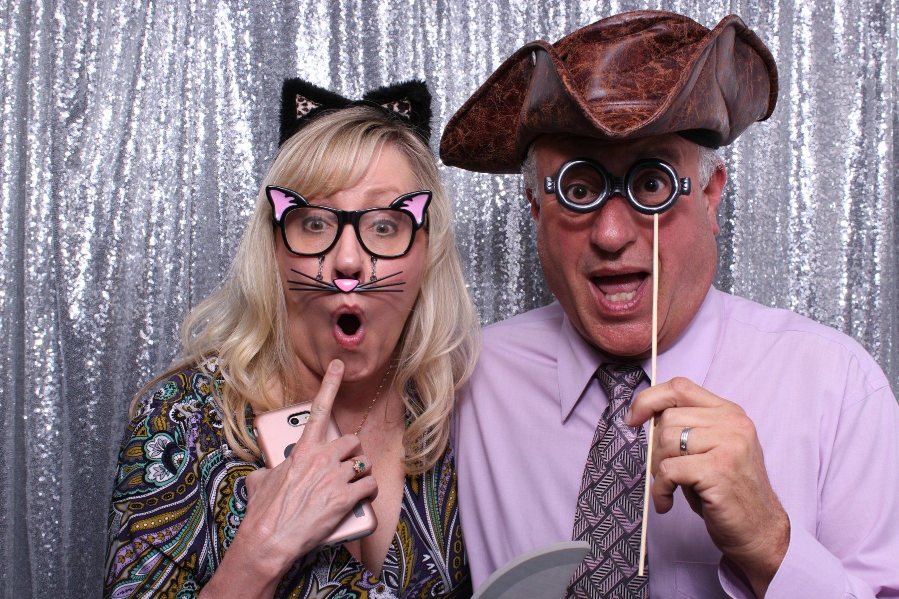 Silver Sequin backdrop on cue photo booth