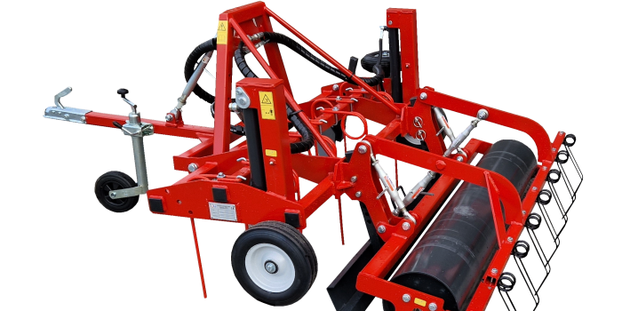 Versatile grader with several different adjustment options. The grader is suitable for most surfaces. Long, strong (12mm) front pins allow for efficient machining. The adjustable grader plank smooths out unevenness quickly and smooth. The adjustable roller can be filled with water if necessary for stronger packing. The grader is equipped with adjustable board wheel and border plough. The grade is easily transported thanks to the hydraulically folding wheels. Horse Arena Grader/Leveller (180)