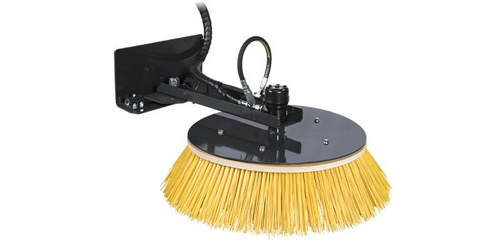 The circular broom is an efficient broom that moves the material sideways. It is a useful attachment when sweeping materials to the side or away from the wall. It rotates in both directions and can be used for various tasks.  Norcar Multi as standard. Brush, round (plastic)
