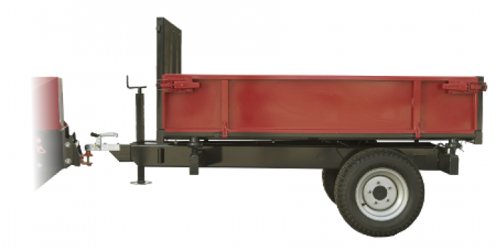 Powerful and versatile trailer with a 3-way tip. The direction of tipping is easily changed by moving the hinge pins placement. Equipped with foldable 35 cm high side walls that can be removed if necessary which opens a totally flat and even bed. The trailer has a very strong frame and a height adjustable trailer coupler. The loader needs to be equipped with a rear hydraulic outlet and trailer hitch. Trailer - 3 way tip