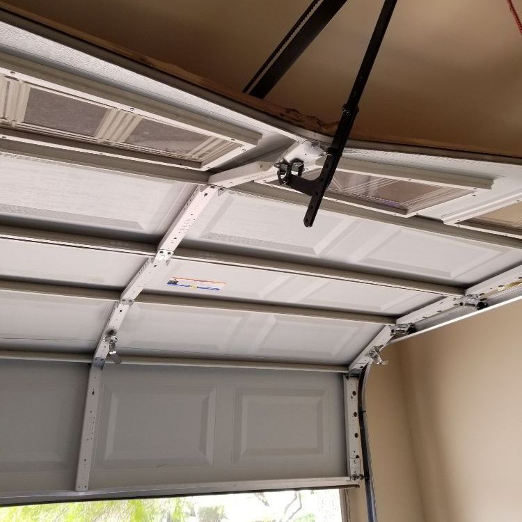 Broken Door. Let 1st Call Garage Door fix your issue!