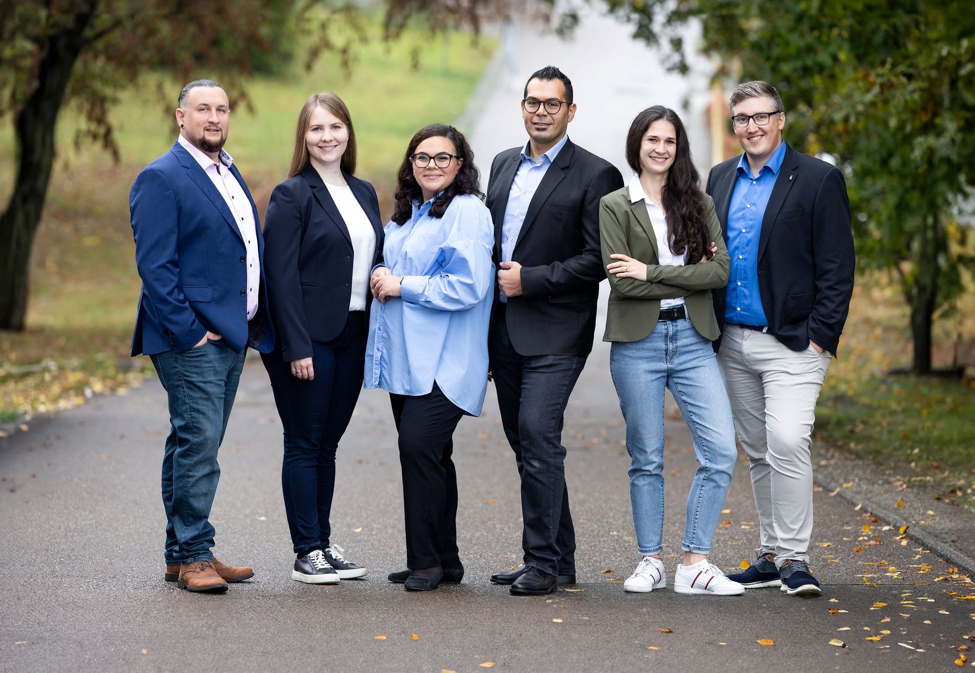 Teambild eines Unternehmens – Professionelle Gruppenfotografie für Ihre Team-Seite oder Firmenpräsentation.