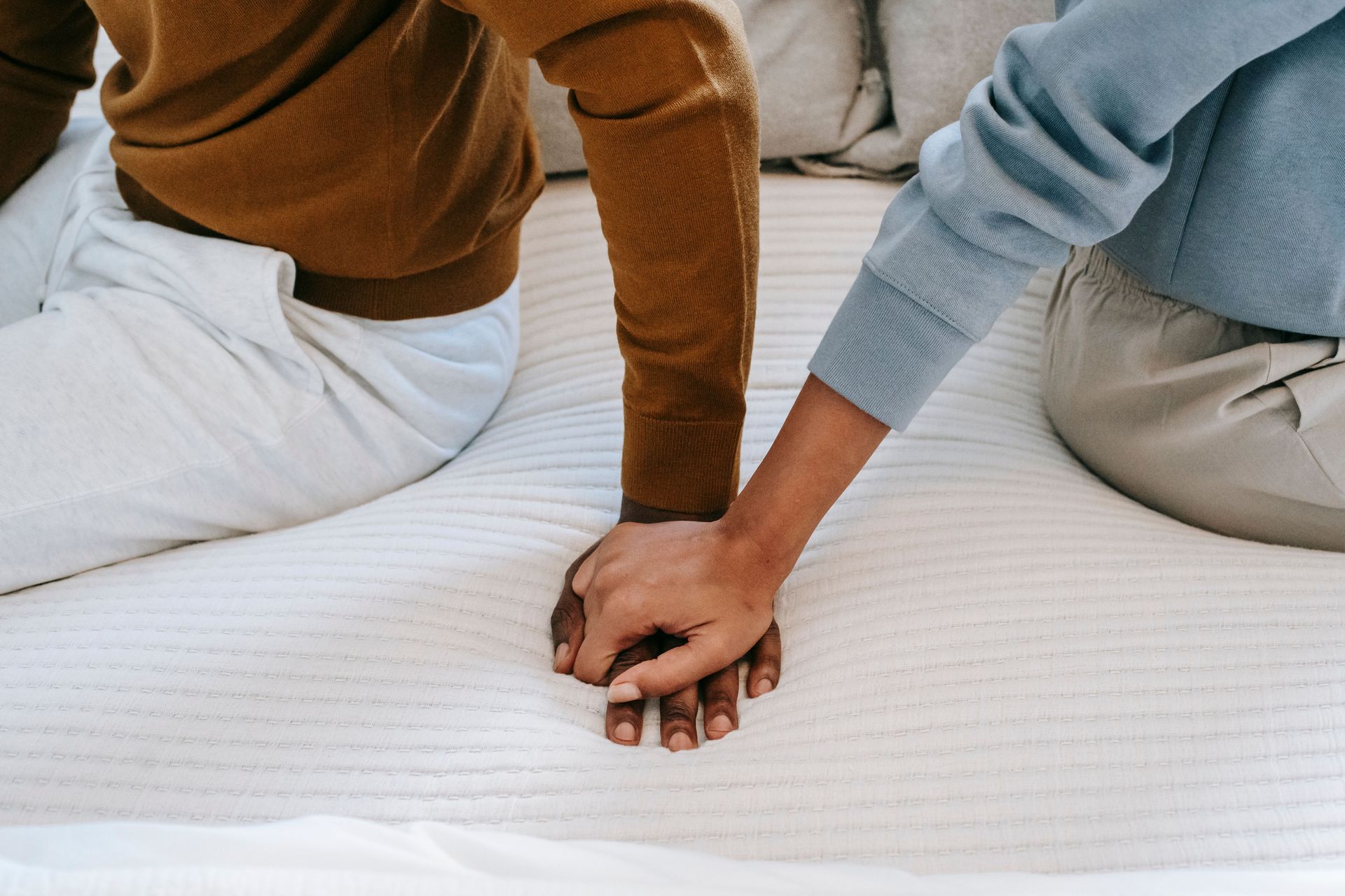 Couple holding hands