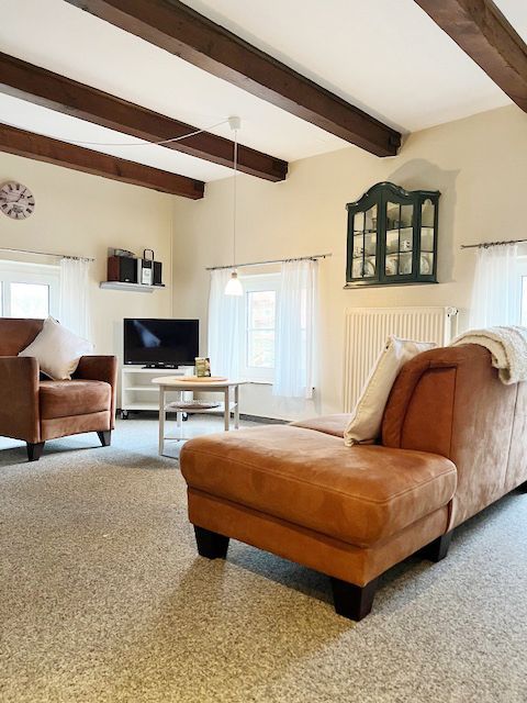 Wohnzimmer mit Couchgarnitur Landliebe