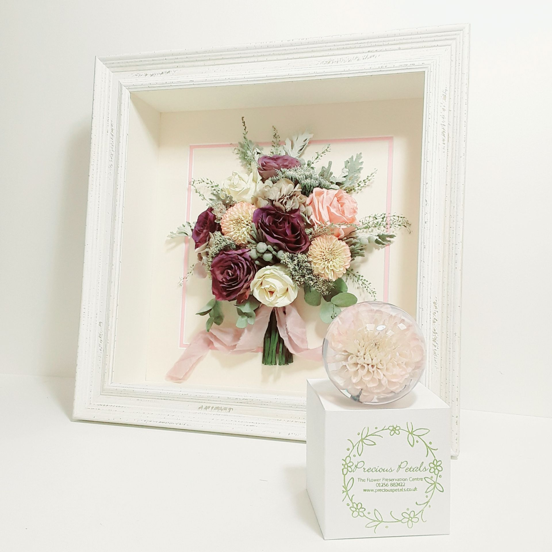 3d preserved wedding bouquet in white frame with a flower a in paperweight