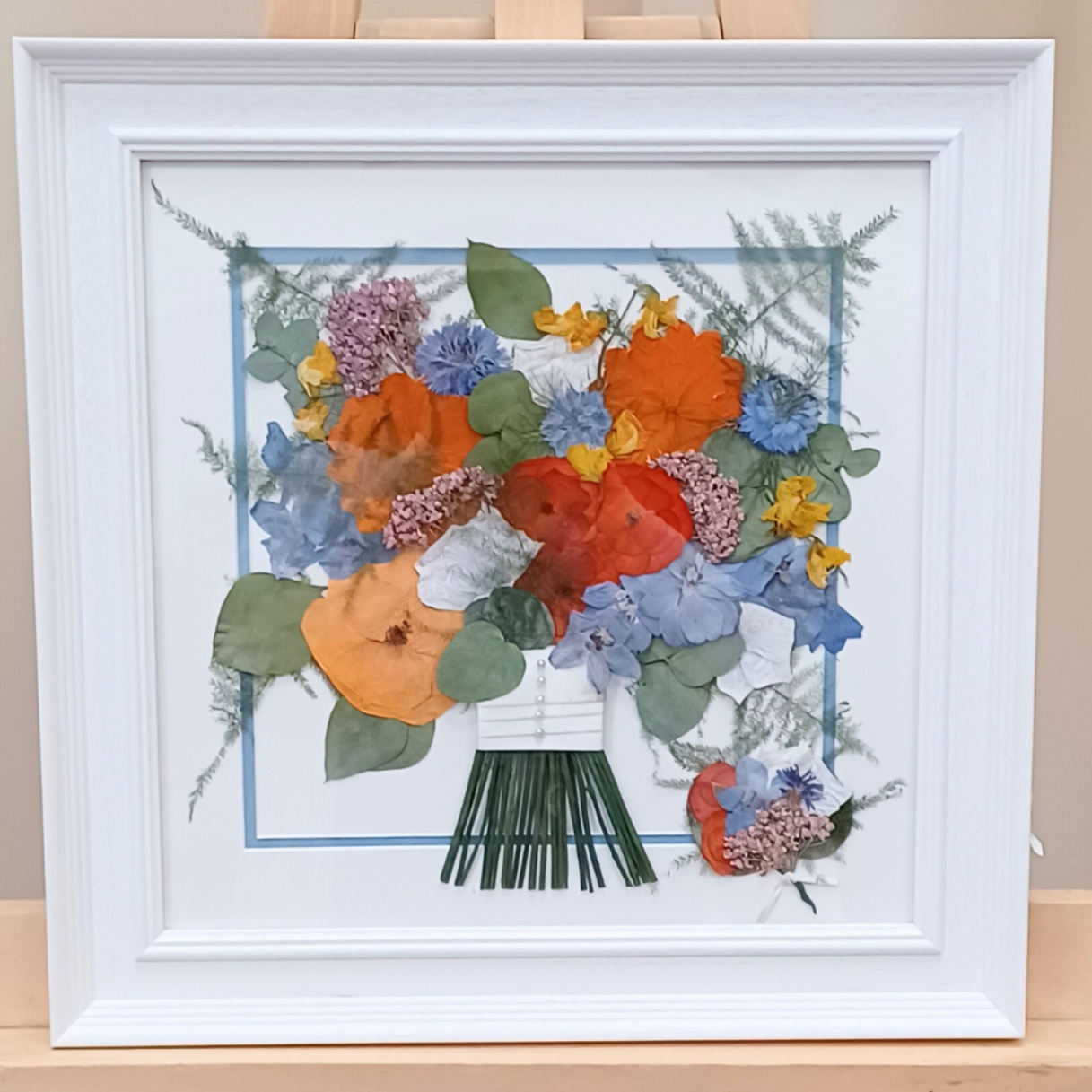 pressed wedding bouquet in modern white frame
