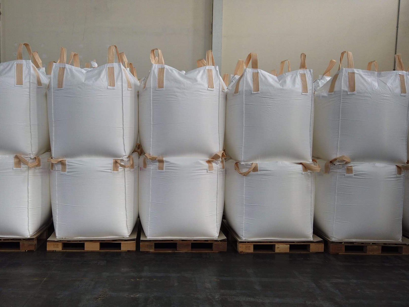 Bulk chemical raw materials stored in FIBC big bags in a warehouse